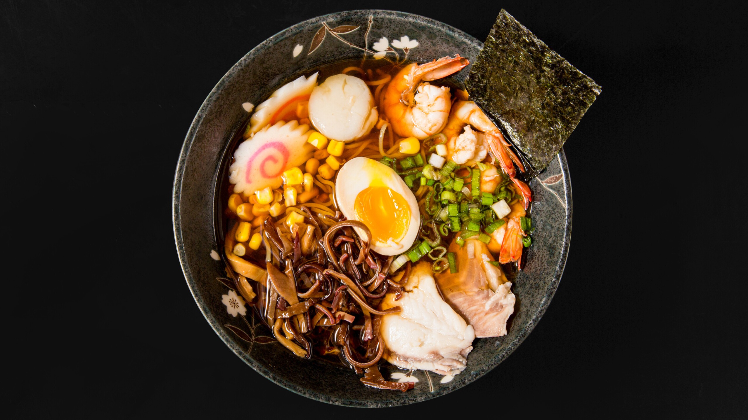Seafood ramen with shrimp, egg, corn, seaweed at Wafuu Izakaya, a Japanese Restaurant in Forest Hills
