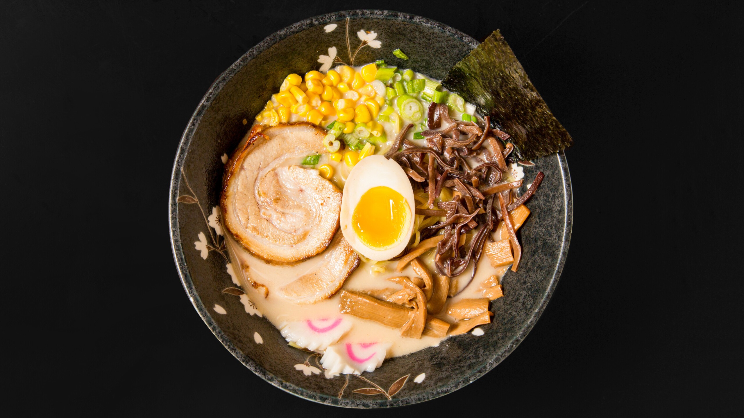 Tonkotsu ramen with pork, egg, corn, seaweed, bamboo shoots at Wafuu Izakaya, a Japanese Restaurant in Forest Hills